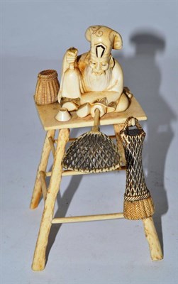 Lot 174 - A late 19th/early 20th century Japanese ivory fisherman