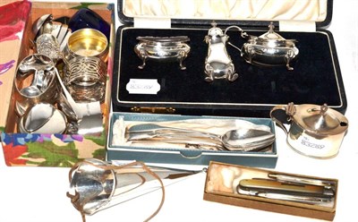 Lot 175 - An assortment of 19th/20th century silver cruets, condiments, spoons, napkin rings etc, various...