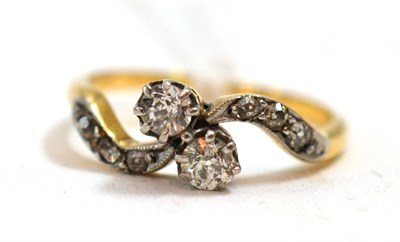 Lot 200 - A diamond two stone twist ring