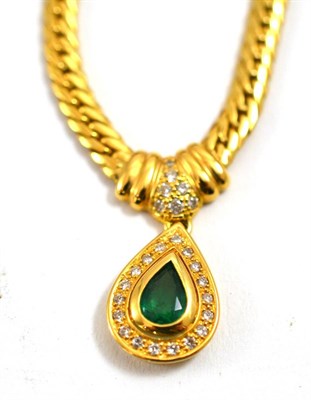 Lot 223 - An emerald and diamond set pendant necklace, clasp stamped '750'