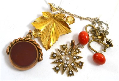 Lot 228 - A 9ct gold citrine set leaf brooch, a seed pearl set pendant, a pair of coral screw back...