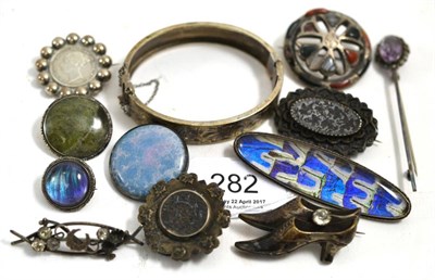 Lot 282 - A Ruskin pottery brooch, two butterfly wing brooches, a Scottish hardstone brooch, various...
