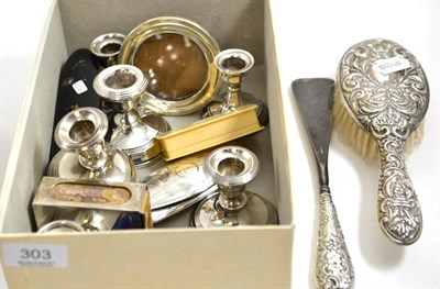 Lot 303 - Seven silver mounted dwarf candlesticks, silver match holder, silver photograph frame, silver...