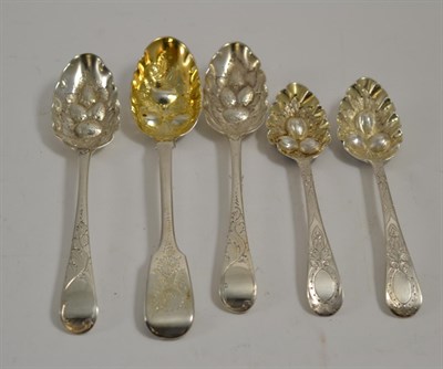Lot 307 - Two pairs of silver berry spoons, together with another berry spoon with gilt interior