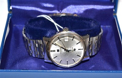 Lot 311 - A stainless steel automatic wristwatch, signed Tissot, model: Seastar, with Tissot box