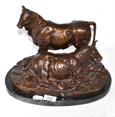 Lot 332 - A bronze group of cattle, oval marble base