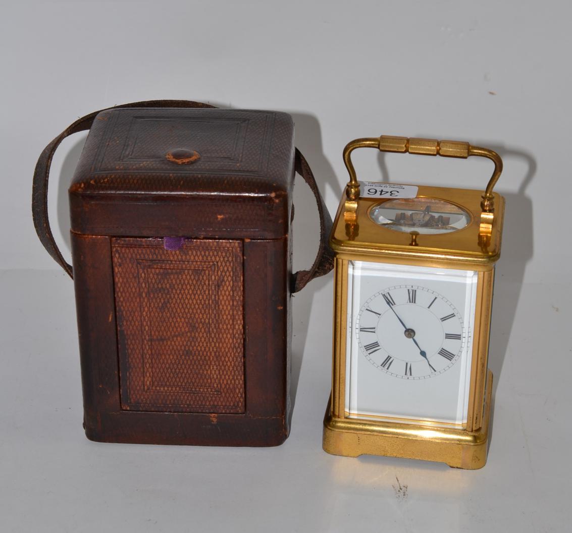 Lot 346 - A brass striking and repeating carriage clock, with fitted case