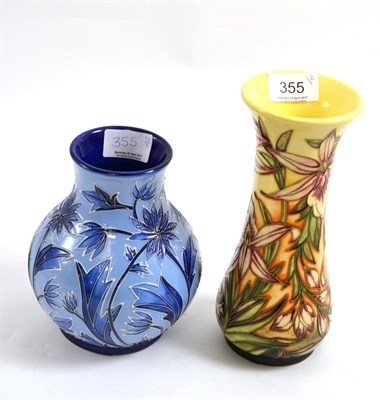 Lot 355 - Two modern Moorcroft vases, 'Northern Star' and 'Sunderland' pattern, 15.5cm high and 21cm high...