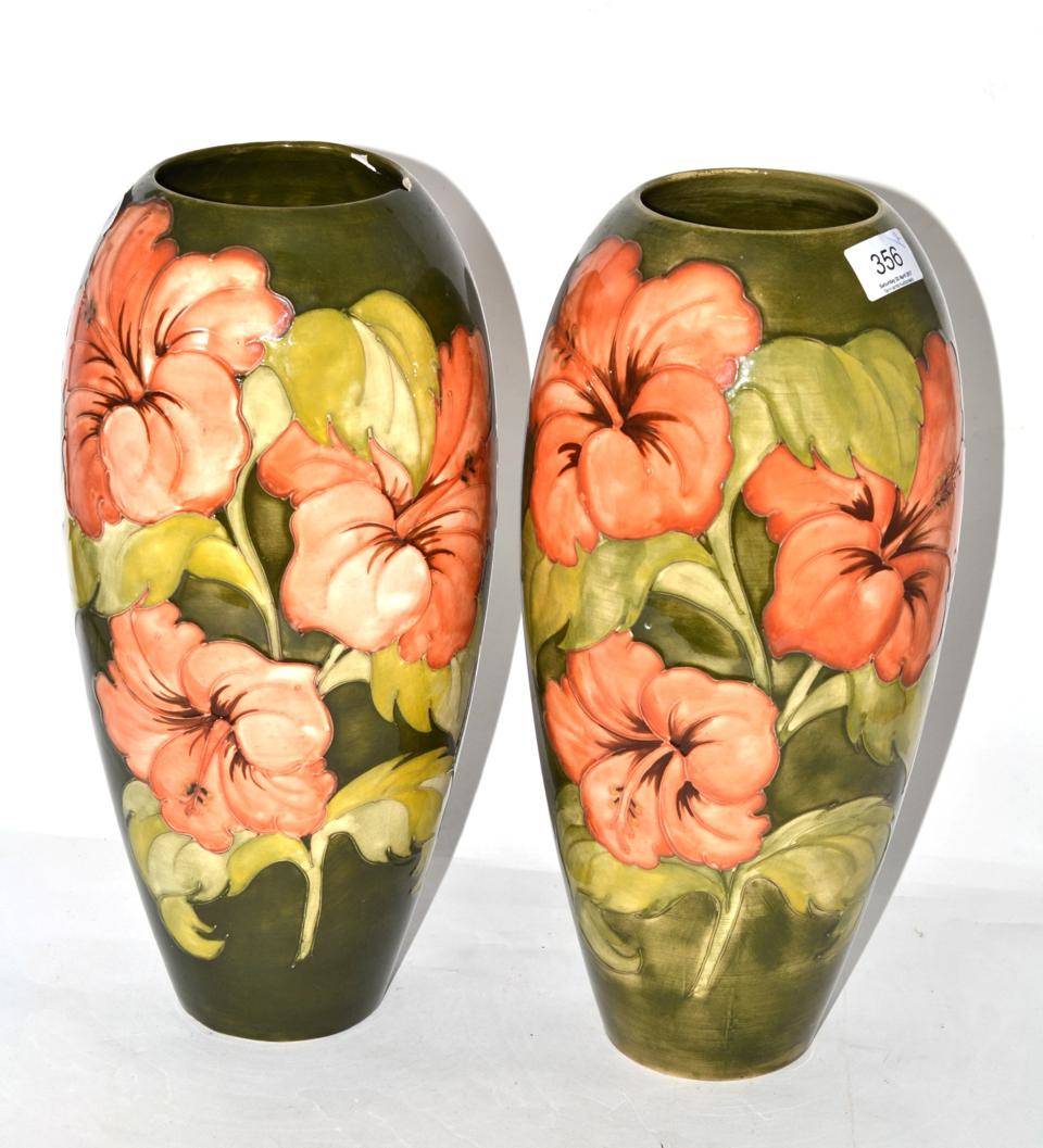 Lot 356 - A pair of Walter Moorcroft Hibiscus pattern vases (one a.f.)
