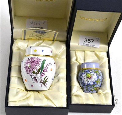 Lot 357 - Two modern Moorcroft enamels, 'Marlborough' and 'Love in the Mist' pattern (both boxed)
