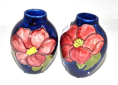 Lot 365 - Two Walter Moorcroft Clematis pattern vases