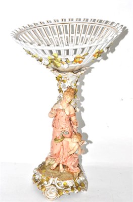 Lot 374 - A late 19th early 20th Dresden porcelain centrepiece, the pierced floral encrusted bowl raised...