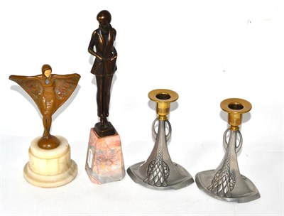 Lot 383 - Two Art Deco style metal figures, each on alabaster base and pair of WMF candlesticks&nbsp