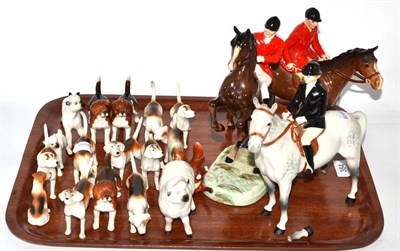 Lot 384 - A collection of Beswick hunt and other figures including: Huntsman, model No. 1501, Huntsman...