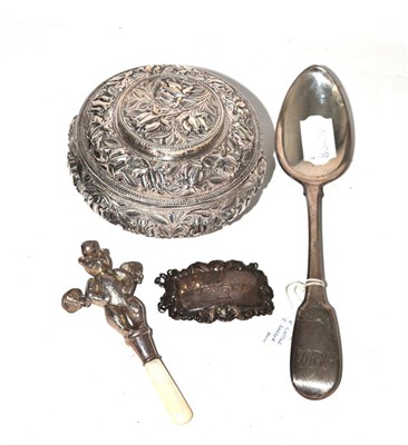 Lot 386 - A silver rattle/teether, York silver spoon, bottle label and white metal bowl and ewer