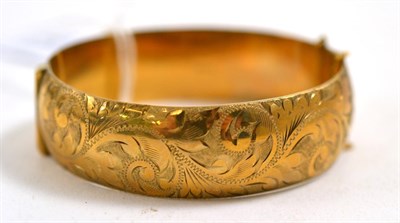 Lot 403 - A 9ct gold bangle