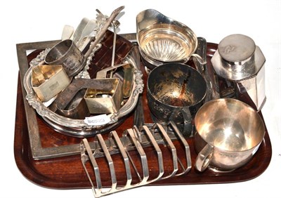 Lot 447 - Two silver cups, silver milk jug, silver napkin rings, silver toast rack, silver teaspoons,...