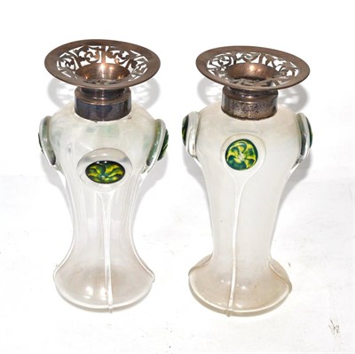 Lot 462 - A pair of Art Nouveau glass vases with pierced silver mounts