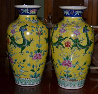 Lot 494 - A pair of decorative Chinese yellow ground vases