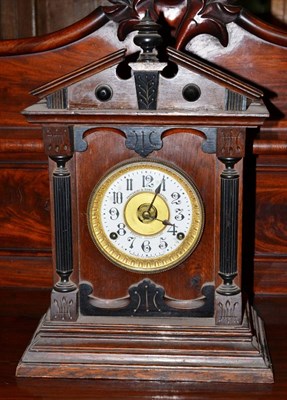 Lot 496 - An oak mantel clock, retailed by Fattorini & Sons, Bradford