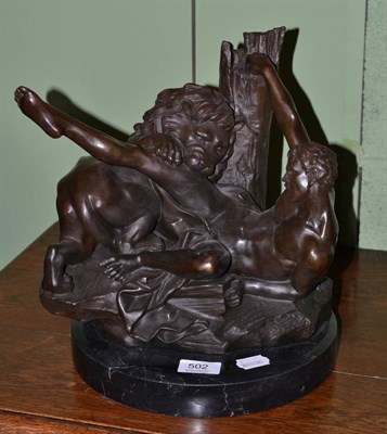 Lot 502 - A bronze of a classical figure fighting a lion