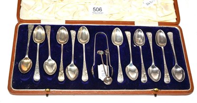 Lot 506 - A set of twelve Edwardian silver coffee spoons and tongs, Sheffield, 1907, cased