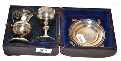 Lot 508 - A Victorian three-piece silver travelling communion set, by Walker and Hall, Sheffield, 1890, cased