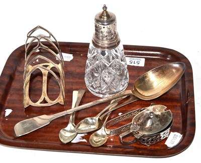 Lot 515 - A group of silver, including George III serving spoon, toast rack, set of five tea spoons etc