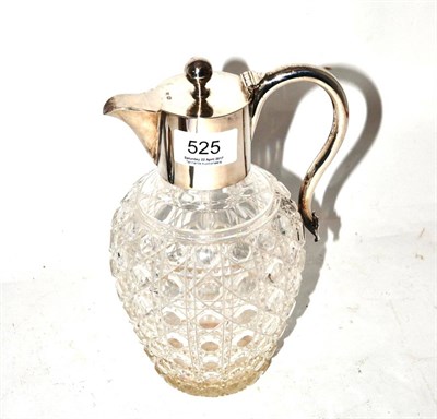 Lot 525 - A silver mounted claret jug