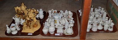 Lot 1014 - A collection of crested china and a pair of Eichwald pottery pipe racks