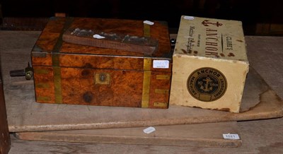 Lot 1021 - A 19th century brass bound burr walnut writing slope, treen kitchen implements, butter press, bread