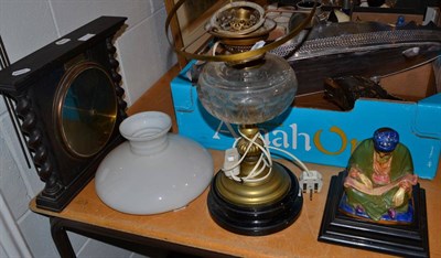 Lot 1030 - Converted oil lamp with opaque shade, ceramic figural lamp base and an oak barometer