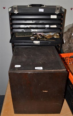 Lot 1035 - A small six drawer watchmaker's cabinet containing wristwatches, watch parts etc together with...