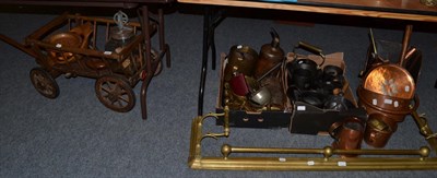 Lot 1060 - A group of 19th century and later copper iron wares, a dog cart, brass fender etc