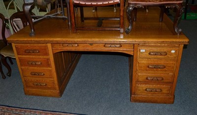 Lot 1071 - An oak partners desk