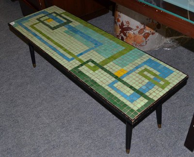 Lot 1083 - A 1960s G-plan tile-top coffee table, of rectangular form, 123cm by 41cm by 41cm