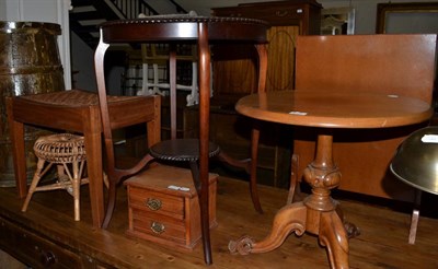 Lot 1094 - Two canework stools, two occasional tables, two leather suitcases, needlework firescreen, and a...