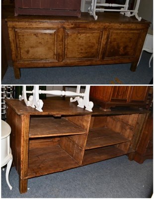 Lot 1102 - An 18th/19th century pine and oak shop counter/dresser base, panelled side, open to opposite,...