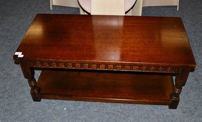 Lot 1103 - A reproduction oak coffee table