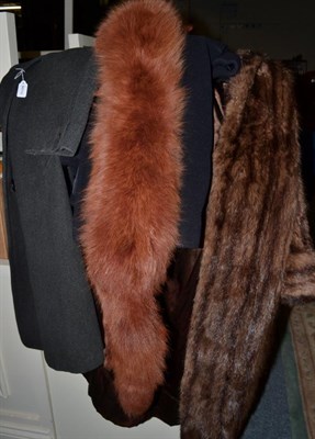 Lot 1120 - A fur coat, three fur wraps, Simpson of Piccadilly coat and another coat