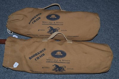 Lot 1121 - Pair of Melville and Moon Roorkhee campaign chairs, each in canvas bags