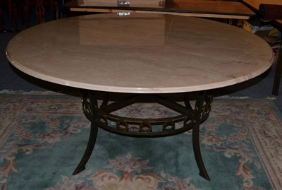 Lot 1127 - A Circular Pink Composition Marble Dining or Centre Table, raised on a wrought iron base with...