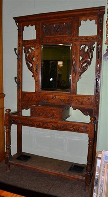 Lot 1181 - Late Victorian carved oak mirrored hall stand