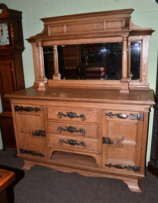 Lot 1193 - An early 20th century oak mirror backed sideboard in the Arts & Crafts taste