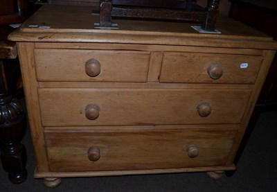 Lot 1201 - A pine chest of drawers