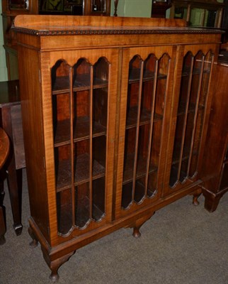 Lot 1205 - Early 20th century glazed bookcase