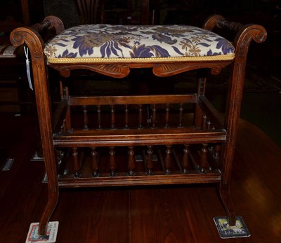 Lot 1207 - A 19th century ratchet music chair with sheet music storage underneath