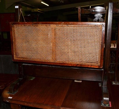 Lot 1209 - A mahogany cane cot