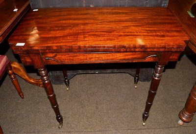 Lot 1210 - A George IV mahogany fold-over gate-leg card table