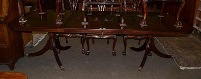 Lot 1217 - Reproduction twin pedestal dining table with two additional leaves